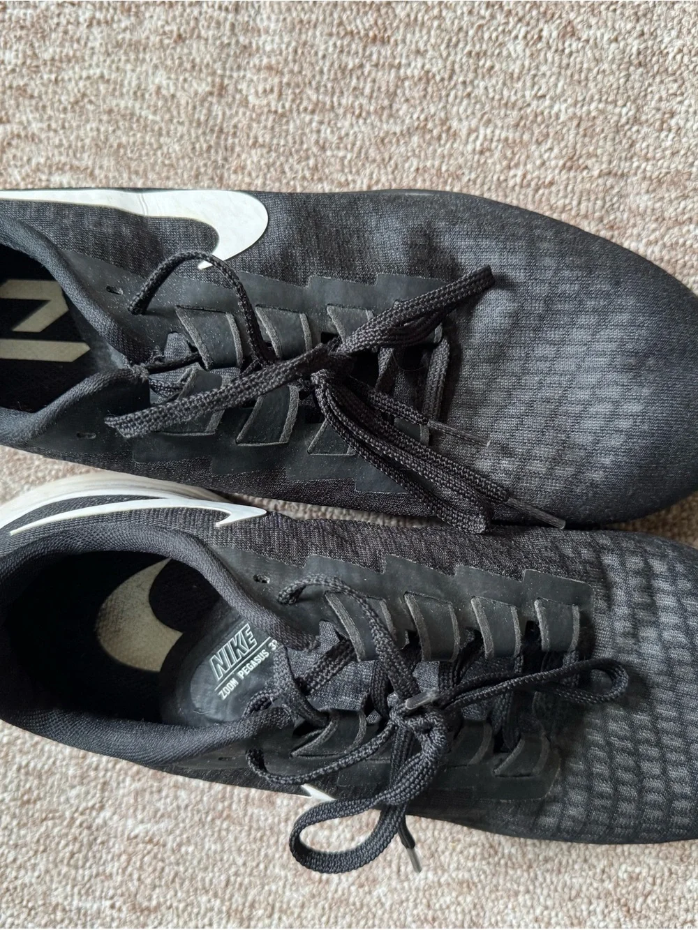 Nike Black Athletic Running Shoes with White Swoosh